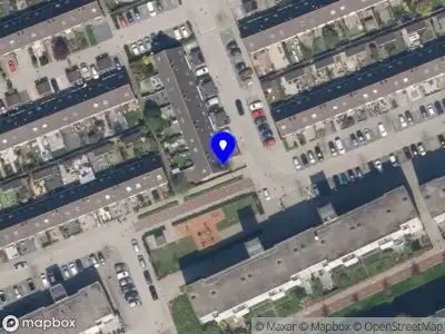 Ambulance met gepaste spoed naar de Huis te Merwestraat in Schiedam