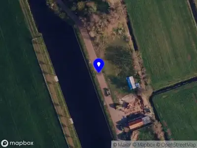 Brandweer met grote spoed naar de Havenstraat in Surhuisterveen vanwege personen te water