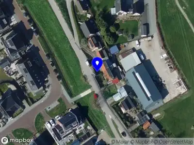 Ambulance met grote spoed naar de Toldijk in Hekelingen