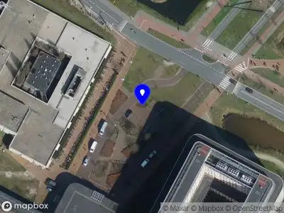 Brandweer met gepaste spoed naar de Molengracht in Breda