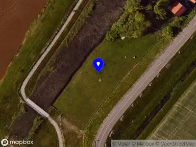 Ambulance met grote spoed naar de Zaandammerdijk in De Waal