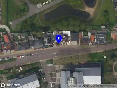 Ambulance met grote spoed naar de Zeeweg in Rockanje