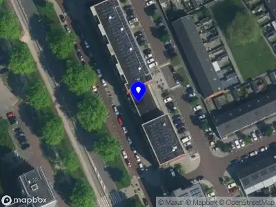 Ambulance met grote spoed naar de Limmenstraat in Amsterdam