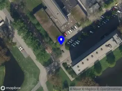 Ambulance met grote spoed naar de Laan van Spieringshoek in Schiedam