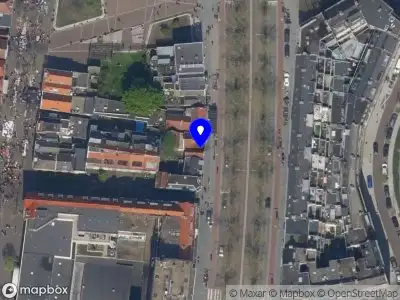 Ambulance met grote spoed naar de Broersvest in Schiedam