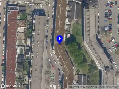 Ambulance met gepaste spoed naar de Schinkelstraat in Rotterdam