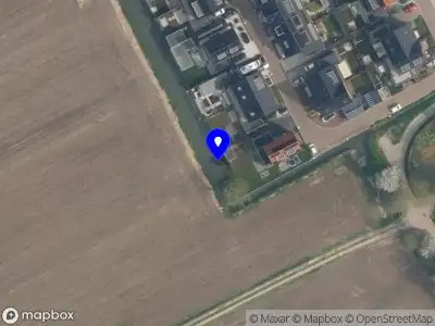 Politie naar de Schoudermantel in Odijk vanwege voertuigen te water