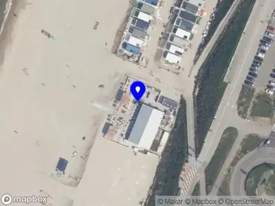 Ambulance en brandweer met gepaste spoed naar de Strandafgang Barnaart in Zandvoort