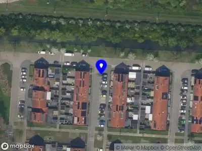 Ambulance met gepaste spoed naar de Arenastraat in Rotterdam