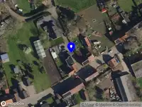 Brandweer met grote spoed naar de Dorpsstraat in Overslag vanwege gebouwbrand