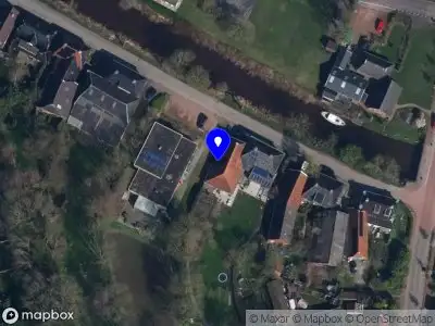 Brandweer met gepaste spoed naar de Vaart Westzijde in Warfhuizen
