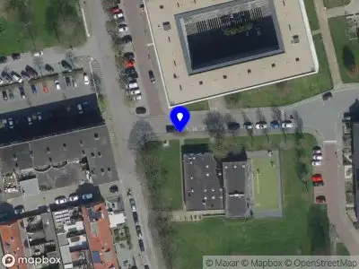 Brandweer en politie met grote spoed naar de Buys Ballotstraat in Breda vanwege gebouwbrand