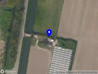 Ambulance met grote spoed naar de Bolnesserkade in Ridderkerk