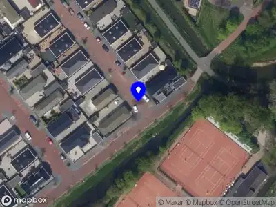 Ambulance met gepaste spoed naar de Stoelenmatterstraat in Leiden