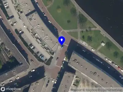 Ambulance met grote spoed naar de Spangesekade in Rotterdam