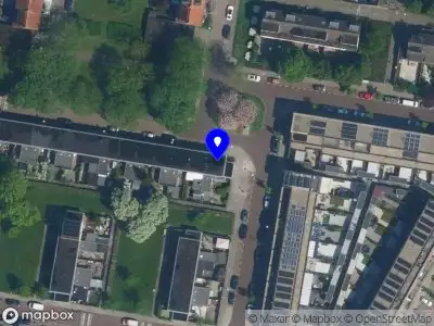 Ambulance met gepaste spoed naar de Willem Kromhoutstraat in Amsterdam