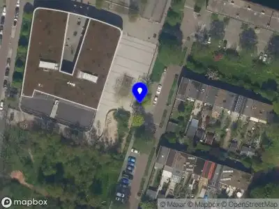 Ambulance met grote spoed naar de Van Baerlestraat in Vlaardingen vanwege gebouwbrand