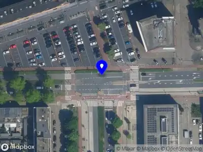 Ambulance met grote spoed naar de Belgiëplein in Amsterdam