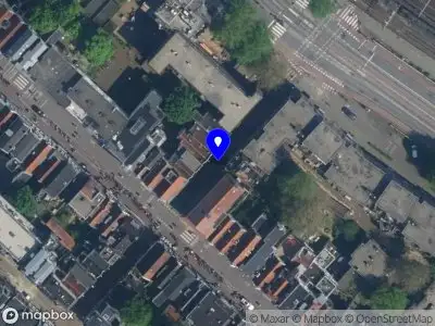 Ambulance met grote spoed naar de Buiten Oranjestraat in Amsterdam