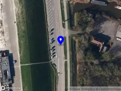 Brandweer met gepaste spoed naar de Westerzeedijk in Harlingen vanwege een buitenbrand