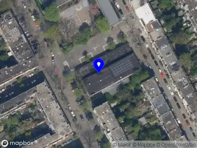 Ambulance met gepaste spoed naar de Nobelstraat in Rotterdam