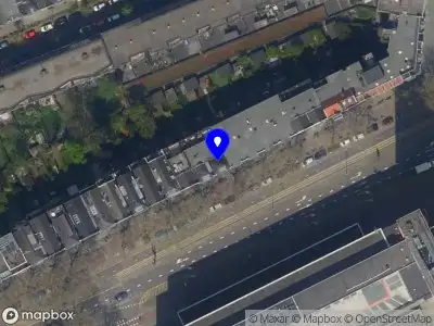 Ambulance met gepaste spoed naar de Rochussenstraat in Rotterdam