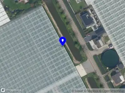 Politie met grote spoed naar de Herenlaan in Maasland vanwege personen te water