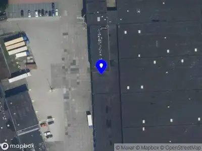 Ambulance met grote spoed naar de Sluispolderweg in Zaandam