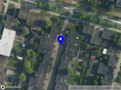 Ambulance met grote spoed naar de Plaatwerkerstraat in Amsterdam