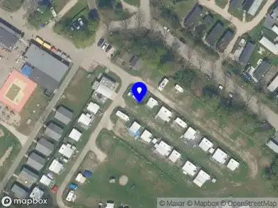 Ambulance met grote spoed naar de Oude Veerdam in Brielle