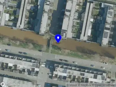 Brandweer en politie met grote spoed naar de Spaarnwoudelaan in Tilburg vanwege gebouwbrand