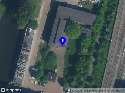 Ambulance met gepaste spoed naar de Johan Broedeletstraat in Amsterdam