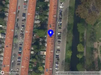 Ambulance met grote spoed naar de Lepelaarsingel in Rotterdam