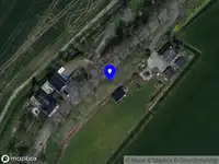 Brandweer met gepaste spoed naar de Weeldijk in Standdaarbuiten vanwege stormschade