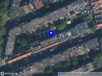Ambulance met grote spoed naar de Sluisstraat in Amsterdam