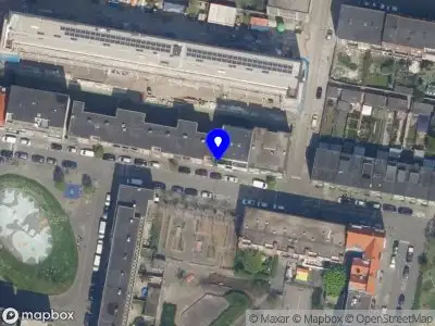 Ambulance met grote spoed naar de Frederikstraat in Rotterdam