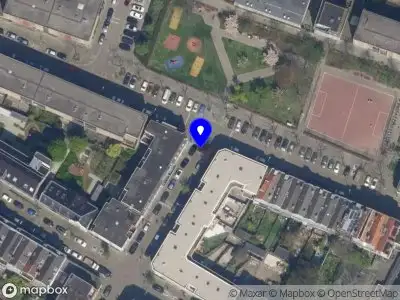 Ambulance met grote spoed naar de Woelwijkstraat in Rotterdam