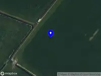 Brandweer en politie met grote spoed naar de Beslingadyk in Friens vanwege middelgrote brand