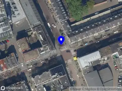 Ambulance met gepaste spoed naar de Witte de Withstraat in Rotterdam