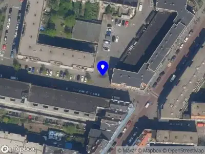 Ambulance met grote spoed naar de Marnixstraat in Rotterdam