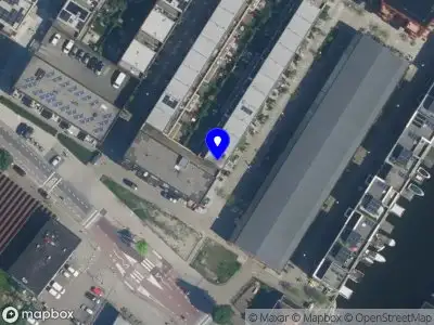 Ambulance met gepaste spoed naar de Melkdistelstraat in Amsterdam