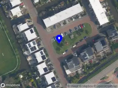 Ambulance met grote spoed naar de J.J. Slauerhoffplantsoen in 's-Gravenhage