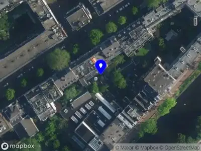 Ambulance met gepaste spoed naar de Rapenburgerstraat in Amsterdam