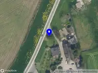 Ambulance met grote spoed naar de Lekdijk in Tienhoven