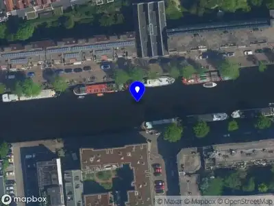 Brandweer met gepaste spoed naar de Zoutkeetsgracht in Amsterdam