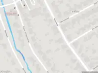 Ambulance met grote spoed naar de Pastoor Schippersstraat in Roggel