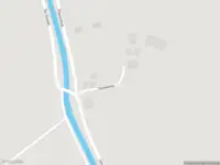 Politie naar de Stouweweg in Ommen vanwege voertuigen te water