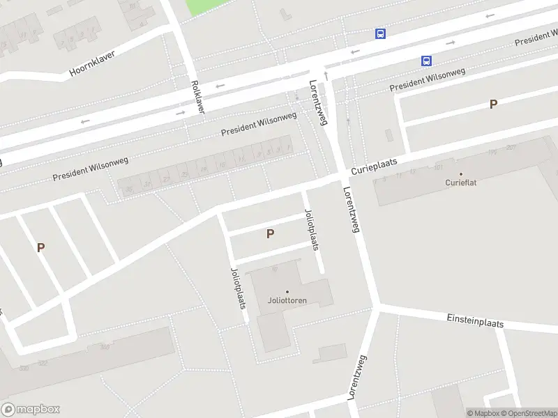 Ambulance met grote spoed naar de Joliotplaats in Rotterdam