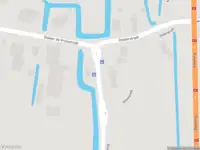 Ambulance met grote spoed naar de Nieuweweg in Benningbroek