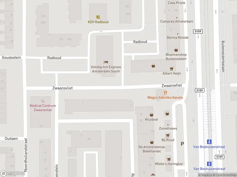 Ambulance met grote spoed naar de Zwaansvliet in Amsterdam